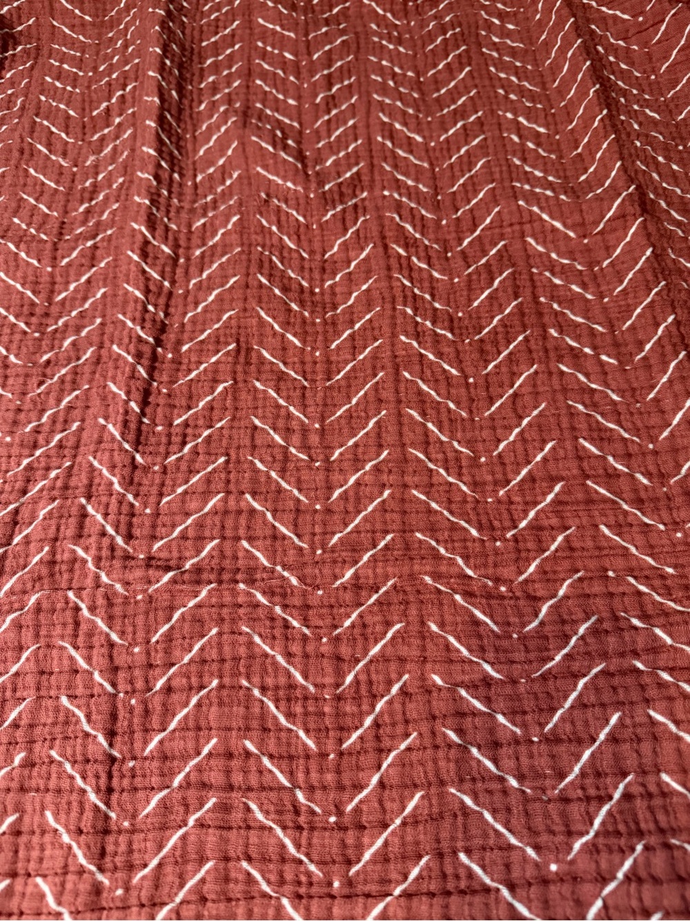 Itzy Ritzy Rust Red Chevron Muslin Swaddle - Picture 2 of 4